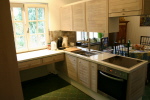 Küche Renovierung Eiche weiß geölt, Glas grün lackiert, Arbeitsplatte Agglomerat